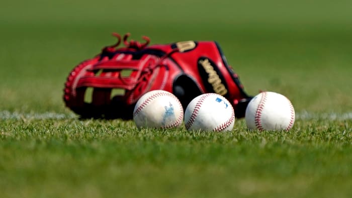 40 MLB players and staff members tested positive for COVID-19 in the past week, creating a "sense of urgency" in negotiations.